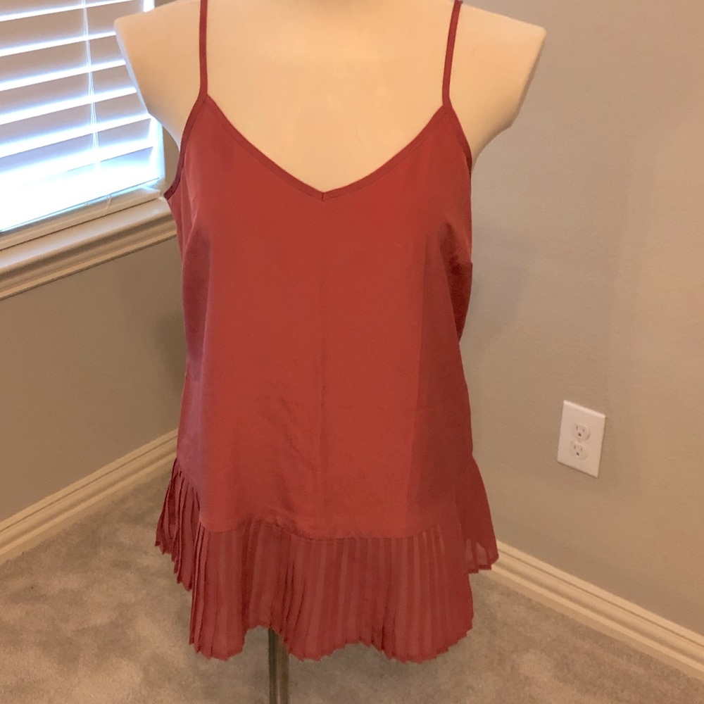 The Limited size small salmon color peplum cami.